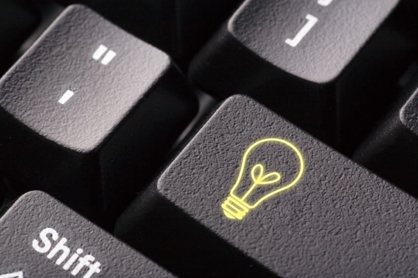 Bild på tangentbordsknapp med en glödlampa som symbol.
